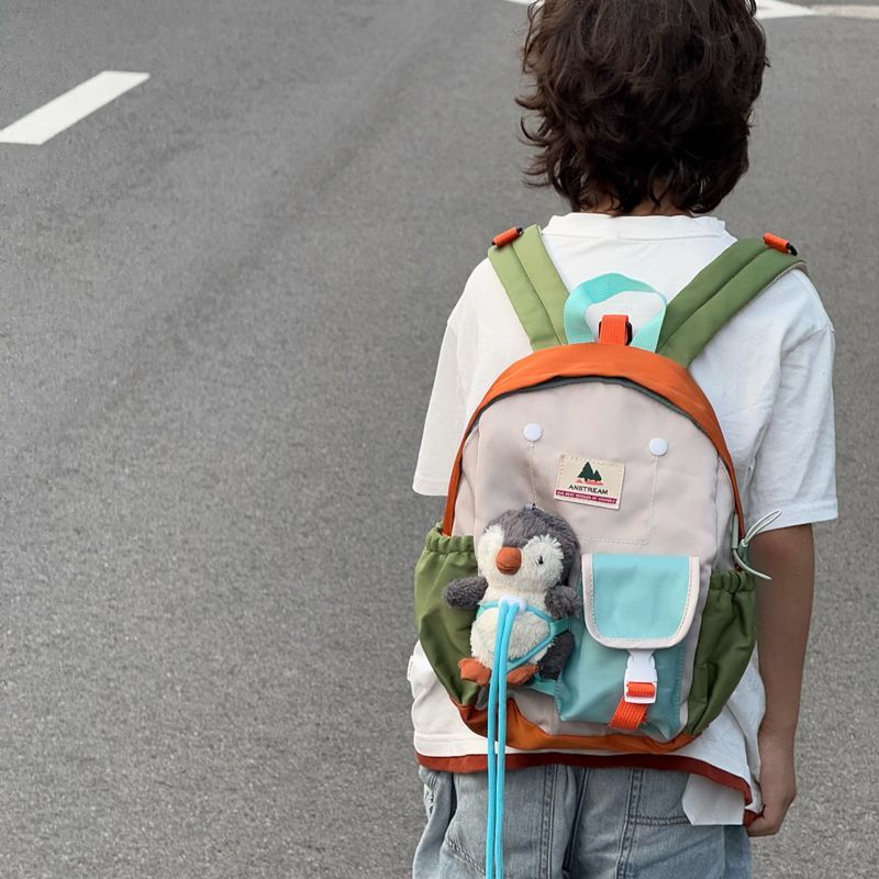 儿童幼儿园书包洋气宝宝公仔背包可爱超轻小学生户外出游双肩背包