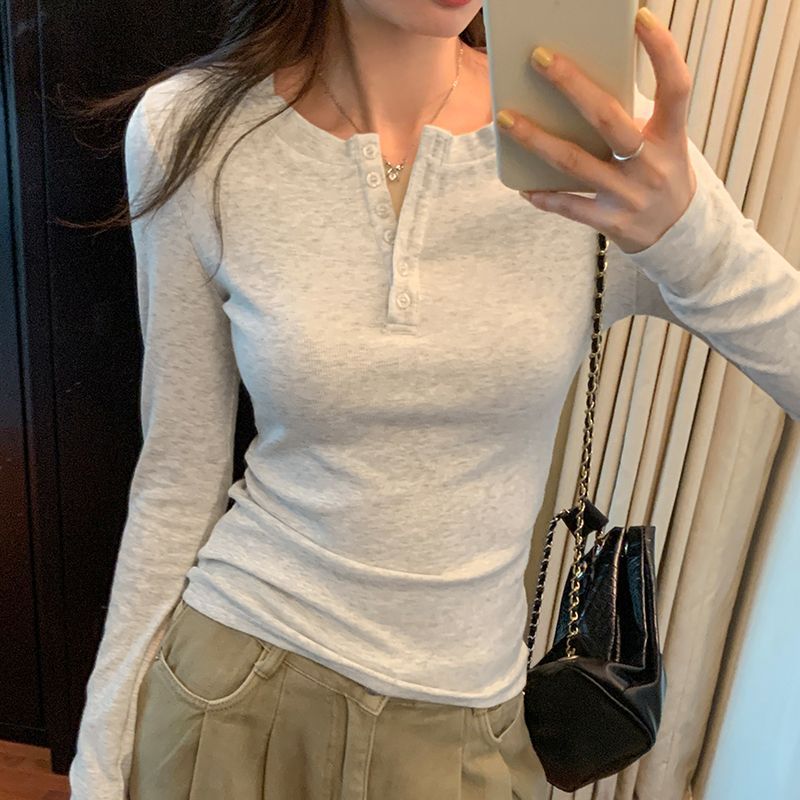 白花灰正肩排扣打底衫女春秋半开领修身甜辣内搭上衣简约长袖T恤